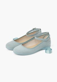 Light blue suede ballet flats with ankle straps, rounded toes, and a rolled ribbon detail. Soft texture and a flexible rubber sole.