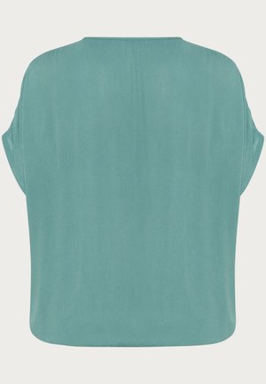 Un haut ample à manches courtes en tissu teal doux, avec un col rond et une texture lisse, présentant un design à dos droit.