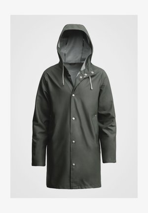Dark green, waterproof raincoat with a hood, long sleeves, snap buttons, and side pockets. Smooth, coated exterior, casual design.