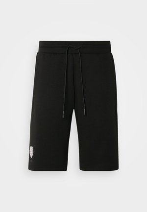 Pantalones cortos de sudoración negros, confeccionados en mezcla de algodón, con cinturilla elástica y cordón, dos bolsillos laterales y un pequeño logo en la pierna.