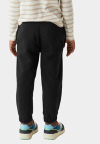 Marks & Spencer Pantalones deportivos - black mix