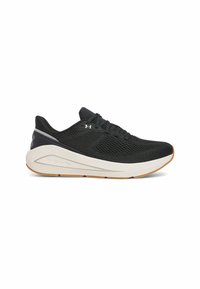 Black athletic shoe with a breathable mesh upper, round toe, and white midsole. Features a textured design and rubber outsole for grip.