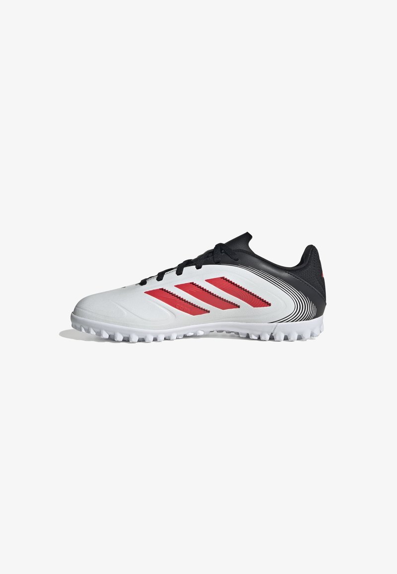 White athletic shoe with red accents and three stripes, featuring a smooth upper, textured side panel, and a rubber traction outsole.