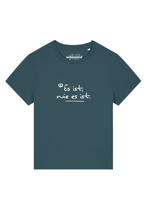 Teal crew neck t-shirt made of cotton, featuring white text: "Es ist, wie es ist," on the front with a relaxed fit and short sleeves.