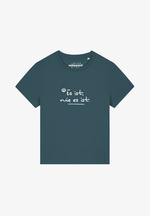 Teal crew neck t-shirt made of cotton, featuring white text: "Es ist, wie es ist," on the front with a relaxed fit and short sleeves.