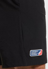 DEF SHOP X EUROPEAN LEAGUE OF FOOTBALL MUNICH RAVENS - Joggebukse - black