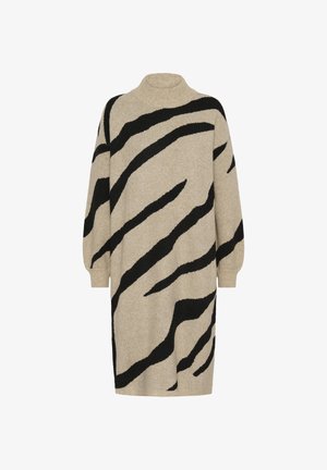 Beige knit sweater dress with a high neck and black zebra-style stripes, featuring long sleeves and a loose fit.