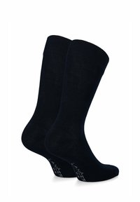 Ciemnoniebieskie bawełniane skarpetki o gładkiej fakturze; sięgające do kolan, o minimalistycznym wzornictwie z białym logo na spodzie.