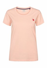 Svetlo ružové bavlnené tričko s okrúhlym výstrihom. Má krátke rukávy a malé červené logo na ľavej hrudi. Mäkká textura, pohodlný strih.