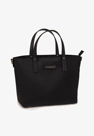 Bolso tote negro con asas dobles, cierre de cremallera y pequeña etiqueta dorada de la marca en el frente.