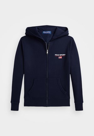 Námorně modrá mikina na zip vyrobená z měkké látky, s předním logem, dvěma předními kapsami a kapucí se stahovací šňůrkou. Hladké manžety na rukávech.