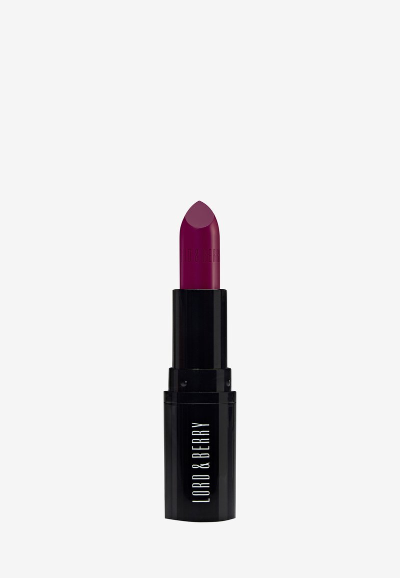 Purple lipstick in a black cylindrical case, featuring a hexagonal tip and brand name embossed on the side in white lettering.