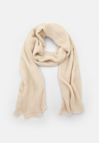 Sciarpa beige realizzata in tessuto morbido e leggero, con una finitura leggermente testurizzata, bordi grezzi e una forma fluida e drappeggiata.