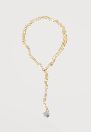 Collier perlé jaune avec un design en boucle et un brin suspendu se terminant par une seule perle ronde translucide.