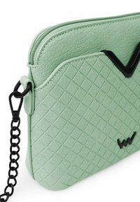 VUCH FOSSY MINI - Taška s příčným popruhem - mint