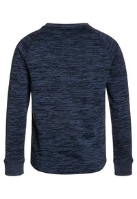 Sweatshirt à manches longues bleu marine avec un motif texturé et chiné. Il possède des poignets côtelés et un col rond, conçu pour un ajustement décontracté.