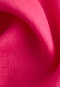 Bright pink fabric, smooth texture, lightweight, folded to show drape and sheen, with subtle woven pattern and a soft finish.