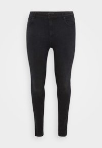 Black skinny jeans made from denim, featuring a classic five-pocket design and a slim fit. Smooth texture with minimal stitching details.