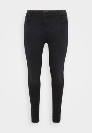 Černé skinny džíny vyrobené z denimu, s klasickým pětiokou designem a štíhlým střihem. Hladká textura s minimem švů.