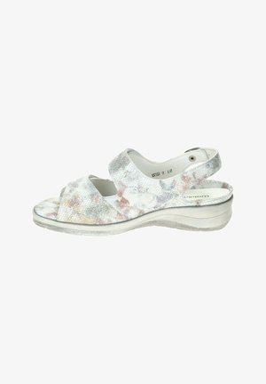 Silver-gray open-toe sandal with low wedge heel, two wide straps, and a textured floral pattern on the upper material.