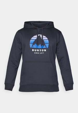 Ciemnogranatowa bluza z kapturem z przednią kieszenią, troczkami i niebieskim motywem góry nad napisem „BURTON SINCE 1977” na piersi.