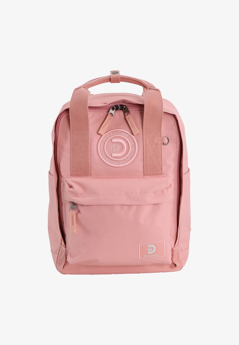 Pink fabric backpack with padded top handle, two adjustable straps, front zip pocket, and embossed logo. Smooth texture, compact rectangular shape.