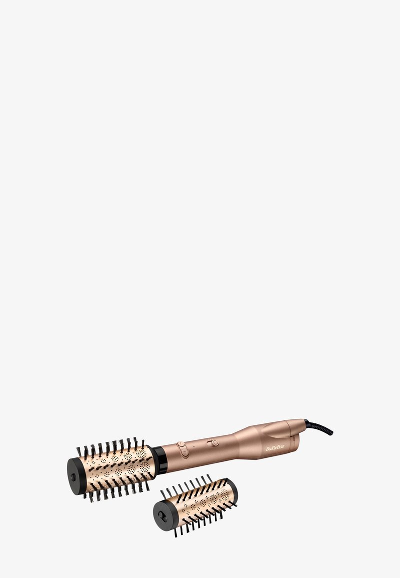 Brosse à cheveux chauffante en or rose avec deux embouts de baril amovibles. Baril texturé avec des perforations pour le passage de l'air ; manche élégant et ergonomique.