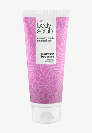 Tube de gommage corporel B12 avec motif de feuilles roses, étiqueté gommage exfoliant pour une peau éclatante par Australian Bodycare.