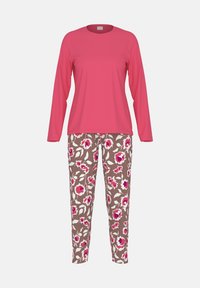 Lange mouwen effen roze top gecombineerd met bruine broek met roze en witte bloemenpatronen.
