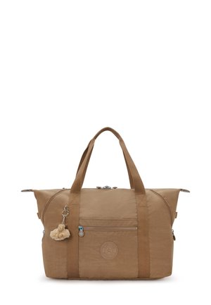 Brown Kipling duffel bag with dual handles, front zip pocket, and small plush monkey keychain attached to one handle.