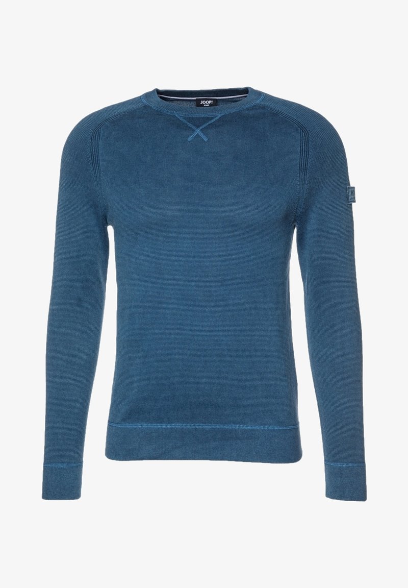 Pull en maille bleu avec des manches longues, col rond, tissu texturé et détails de couture contrastés. Écusson logo sur la manche gauche.