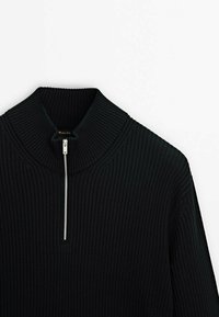 Black ribbed knit sweater with a high collar and a silver zipper detail at the neck. Smooth texture and fitted design.