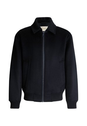 Black jacket made of soft fabric, featuring a zip-up front, collared neck, side pockets, and elastic cuffs at the sleeves and bottom hem.