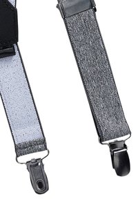 Justerbara hängslen i svart och silver. Tyget är lent med en reflektiv glans. Har metalldelar och läderdetaljer.