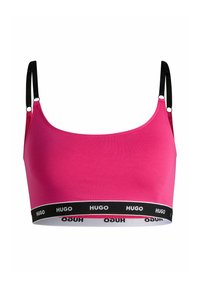 Rosa bralette i mjukt tyg med svarta remmar. Har en svart band längst ner med upprepade vita "HUGO"-loggor.
