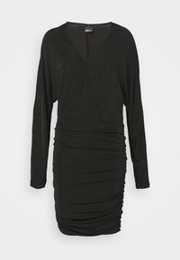 Μαύρο φόρεμα με μακριά μανίκια, V-λαιμόκοψη και ραφές στη μέση για σχήμα. Φτιαγμένο από μαλακό, απαλό υλικό.