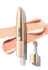 Flytande concealer med en guldfärgad twist-up applicator och en persikofärgad nyans; åtföljs av krämiga produktprover i ljusa och medelhöga nyanser.