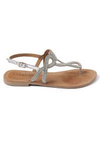 Sandali infradito decorati in tonalità argento, con una soletta imbottita beige e cinturino alla caviglia regolabile, caratterizzati da un design curvo e una texture liscia.