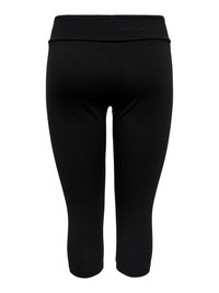 Schwarze, knielange, eng anliegende Leggings mit breitem Bund, von hinten auf weißem Hintergrund dargestellt.