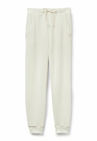 Crèmekleurige joggingbroek van ribstof, met een trekkoordband, zijzakken en taps toelopende manchetten.