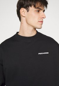 Pegador LOGO OVERSIZED SWEATER - Sweatshirt - black