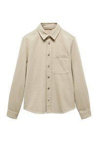 Camisa de botones de manga larga en un tono beige claro, fabricada en una tela suave. Presenta un cuello clásico, bolsillo frontal y botones metálicos.