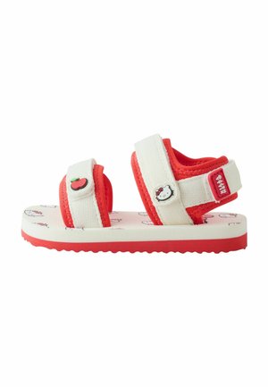 Rood-witte kindersandaal met open teen en verstelbare bandjes, met Hello Kitty en appel versieringen op een patroonzool.