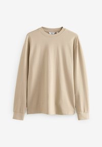 Beige langemouwen t-shirt van katoen. Heeft een ronde hals, ribgebreide manchetten en een ontspannen pasvorm met een gladde textuur. Geen patronen of accenten.