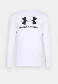 Biała koszula z długim rękawem wykonana z bawełny, z okrągłym dekoltem. Posiada duże czarne logo Under Armour na piersi.