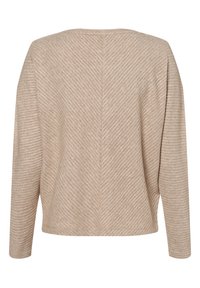 Beige sweater featuring a ribbed texture and a chevron pattern. It has long sleeves and a relaxed fit, with a rounded neckline.