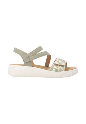 Sandale décontractée pour femmes avec brides vert clair, bride avant à motif, semelle intérieure rembourrée couleur beige et semelle extérieure blanche texturée.