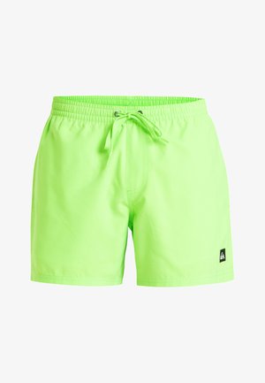 Neon zöld fürdőnadrág elasztikus derékkal, állítható zsinórral és egy kis fekete logóval a bal alsó oldalon.