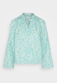 Ljusblå långärmad blus med små vita och teal blommönster, sammanknuten halsringning och V-ringning.