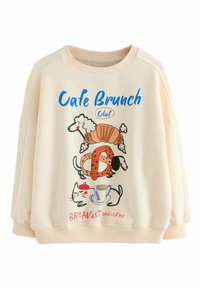 Light cream sweatshirt with a rounded neckline. Features colorful cartoon graphics of animals and food, with the text "Café Brunch Club."